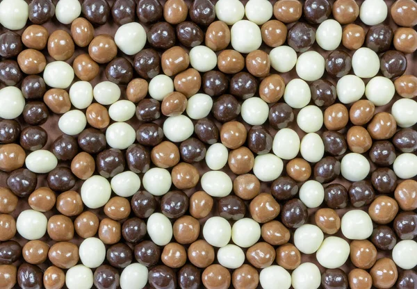 Sok Különböző Színű Kerek Csokoládé Labdák Háttér Kép Felülről — Stock Fotó