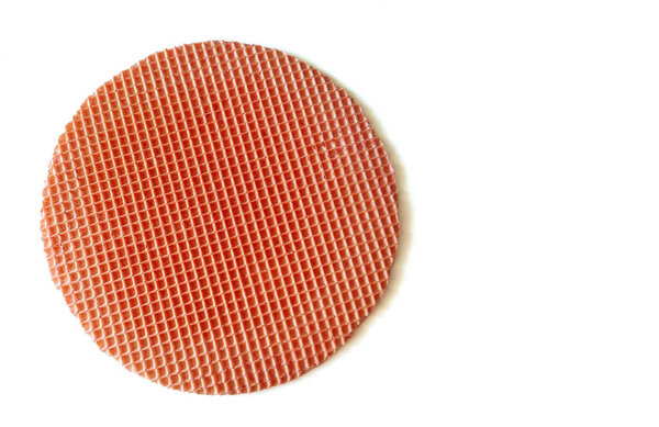 Red round waffle sheet isolated on a white background