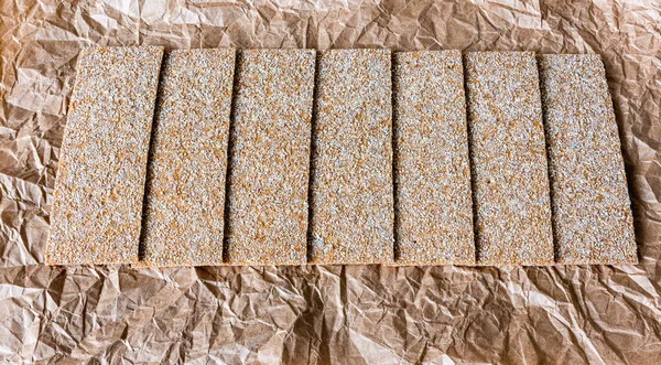Bread Chips Sesame Coriander Pumpkin Sunflower Seeds Crumpled Food Paper — Stock Photo, Image