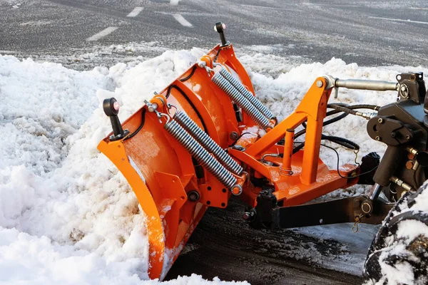 Road cleaning in winter from snow with a bulldozer