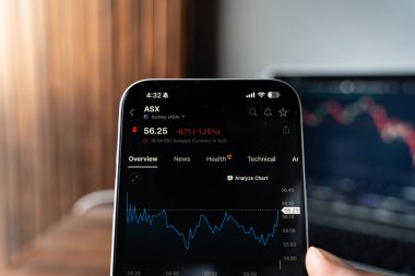 Avustralya Menkul Kıymetler Borsası veya ASX logosu 12 Şubat 2026 'da Hindistan' ın Bangalore kentindeki bir akıllı telefonun ekranında sergilenmektedir.