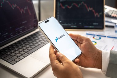 Nasdaq logosu 12 Şubat 2026 'da Hindistan' ın Bangalore kentindeki bir akıllı telefon ekranında sergilenmektedir.