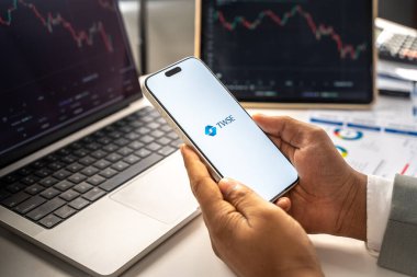 TWSE or Taiwan Stock Exchange Corporation logo is displayed on the screen of a smartphone, in Bangalore, India, on February 12, 2026