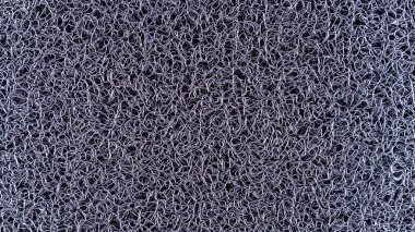 bir ağ şeklinde siyah desenli kumaş,