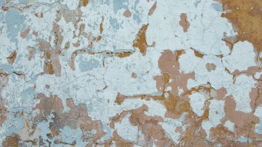 Parçalanmış mavi ve turuncu boyalı eski beton duvar, arka planlar, dokular