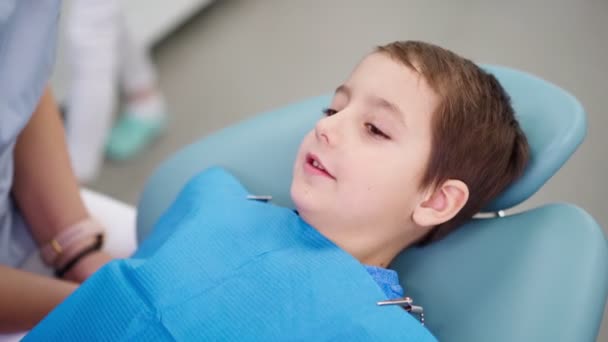 Doctor in Dental Clinic Talking with Funny Little Boy Work Dentist with Children — Stock Video