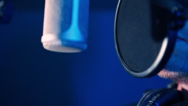 Male Rap Singer Sings Hip Hop in Microphone. Creation Song in Recording Studio — Stock Video