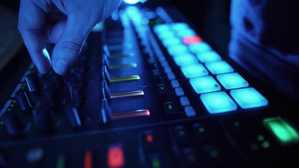 Professional DJ Plays Beat Sampler with Color Drum Pads and Samples in Studio — Stock Video
