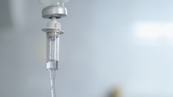 Close-up Infusion Process. Drop Saline is Dripped for IV During Chemotherapy. — Stock Video