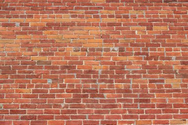 Antik grungy kahverengi kireç tuğla duvar dokusu ortak bağ tuğla deseni, bozulma ve onarılmış bölümleri gösterir (yukarı görünüm))