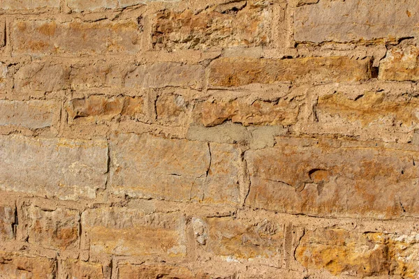 Antik Altın Rengi Kahverengi Taş Bir Duvarın Tam Çerçeve Yapısı — Stok fotoğraf