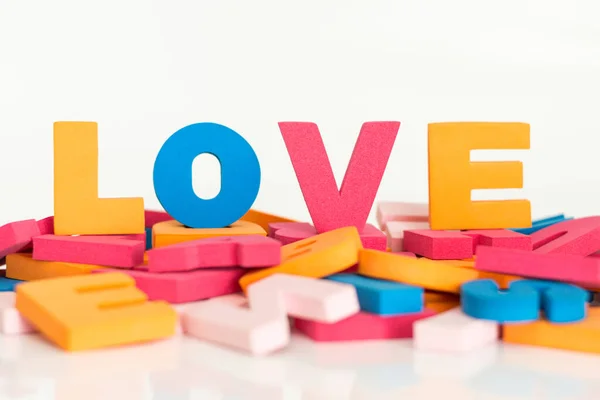 Word made up of multicolored letters. Love.