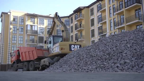Close Yellow Cat Excavator Loader Works Construction Site Gravel Loading — Stock Video