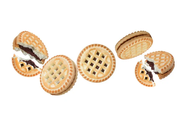 Biscuits Volants Avec Chocolat Isolé Sur Fond Blanc Cookies Dans Photo De Stock