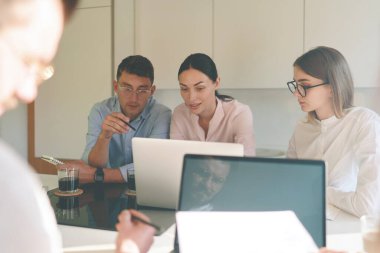 Successful freelancers at a business meeting