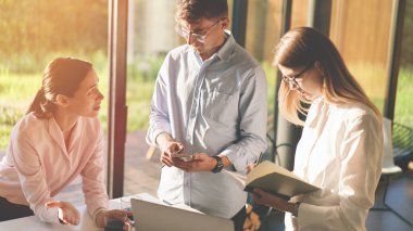 Three focused employees working at home office due quarantine