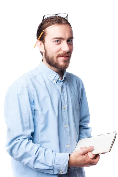 Hombre barbudo sujetando bloc de notas — Foto de Stock