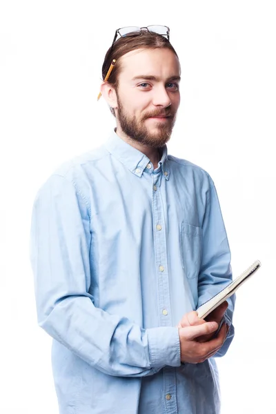 Bearded man holding notepad — Stock Photo, Image