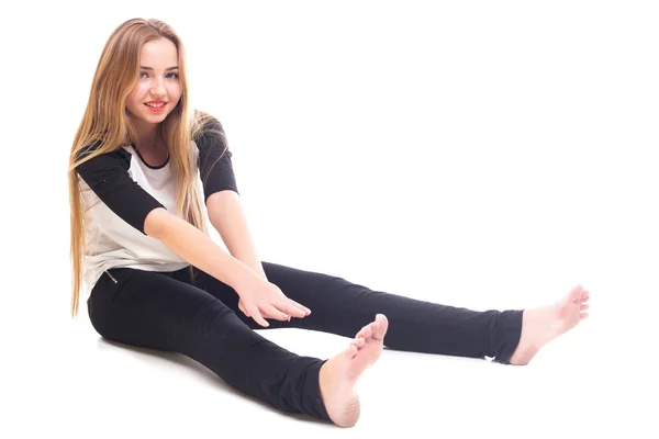 Young girl doing sport exercise — Stock Photo, Image