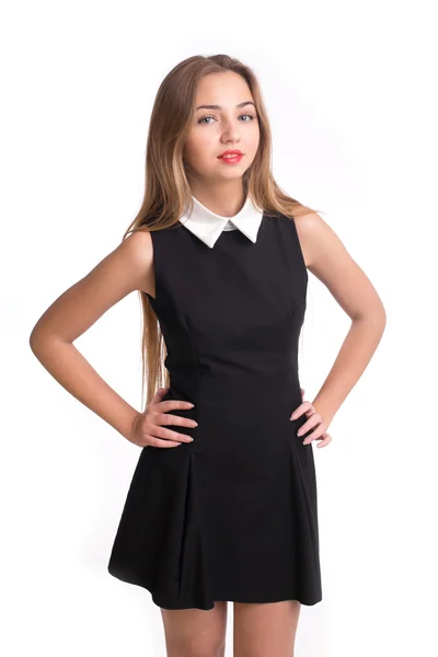Ganska ung flicka i svart klänning — Stockfoto