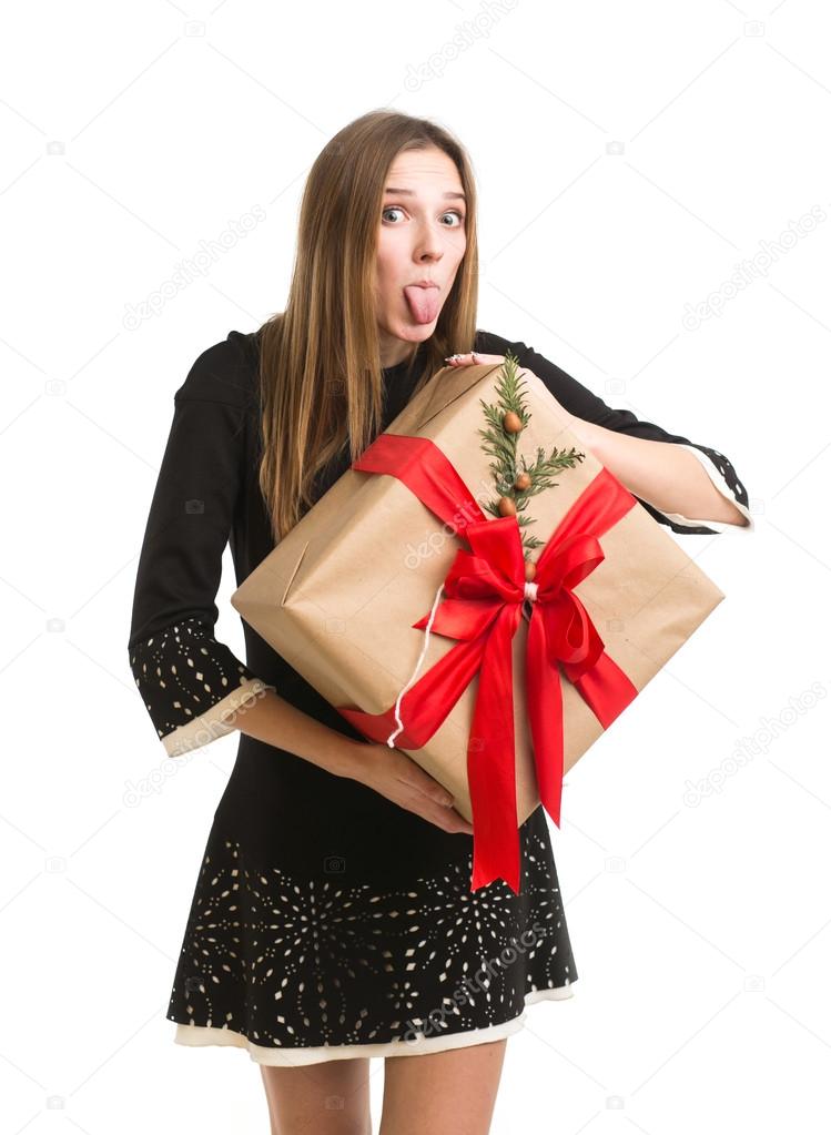 Pretty girl with holiday gift box