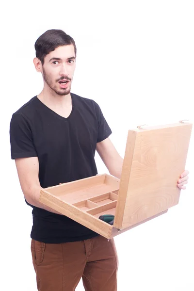 Ung man håller låda med verktyg — Stockfoto