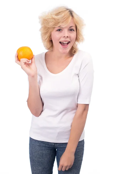 Söt flicka med orange frukt Royaltyfria Stockfoton