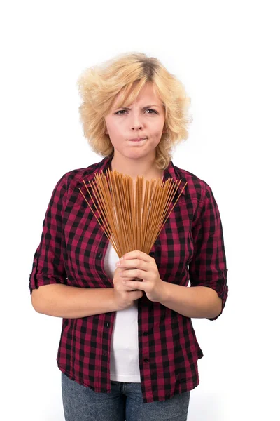 Söt flicka med spaghetti Stockfoto