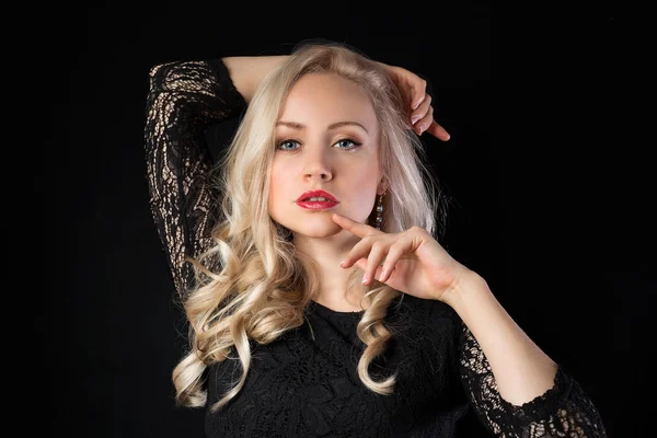 Blonde model in lace on the black background — Stock Photo, Image