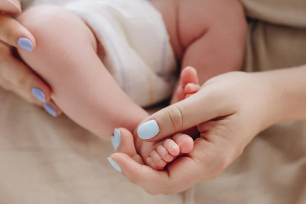 Mother Holding Baby Feet Her Hands — Stock Photo, Image