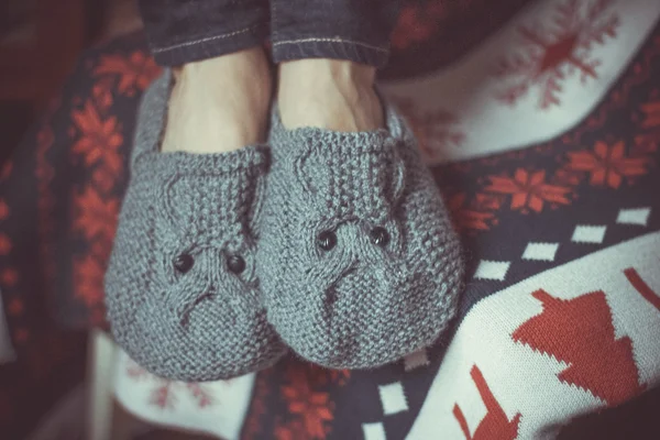 Knitted grey slippers Royalty Free Stock Photos