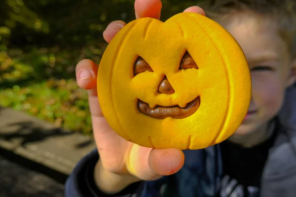 Cute Child Holding Hands Halloween Pumpkin Biscuit Chocolate Close Halloween — Stock Photo, Image