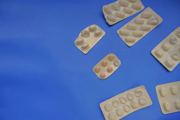 Χάπια Μπλε Φόντο Και Κάψουλες Φαρμάκων Υγιεινή Έννοια Στο Πάνω — Φωτογραφία Αρχείου
