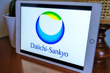 May 2021 Milan, Italy: Daiichi-Sankyo company logo icon on tablet screen in the office. Daiichi-Sankyo illustrative brand clipart