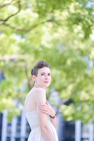 A portrait of a beautiful young Caucasian woman outdoor — Stock Photo, Image