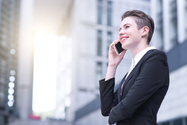 Modern business woman talking on phone
