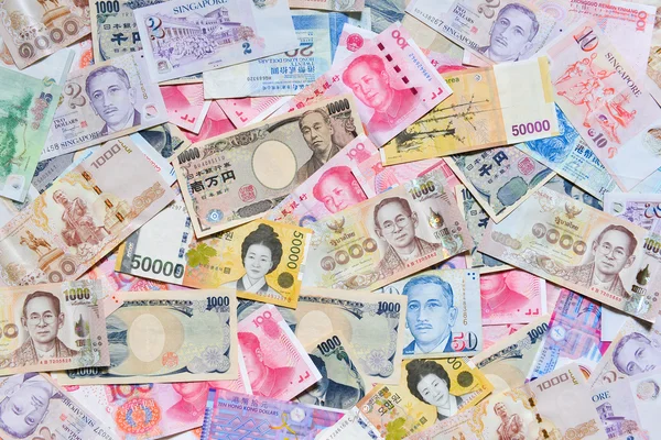 국제 통화, 인민폐, 엔, 원, 바트, 싱가폴 달러, 홍콩 달러 — 스톡 사진