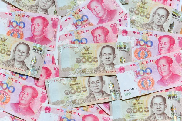 Yuan ou RMB, Monnaie chinoise et Baht thaïlandais — Photo