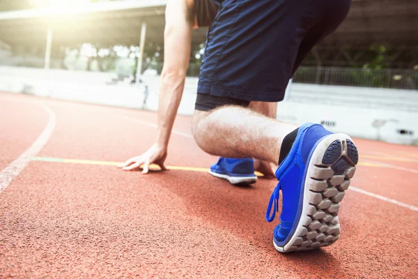 Athlete runner feet running on treadmill closeup on shoe — Stock Photo, Image