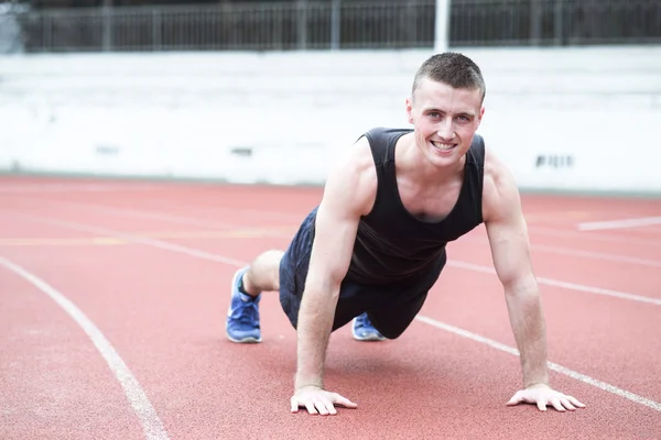 Handsome fit man exercising push up — Stock Photo, Image