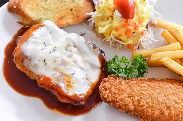 Chicken Steak and fried fish with salad and chips — Stock Photo, Image