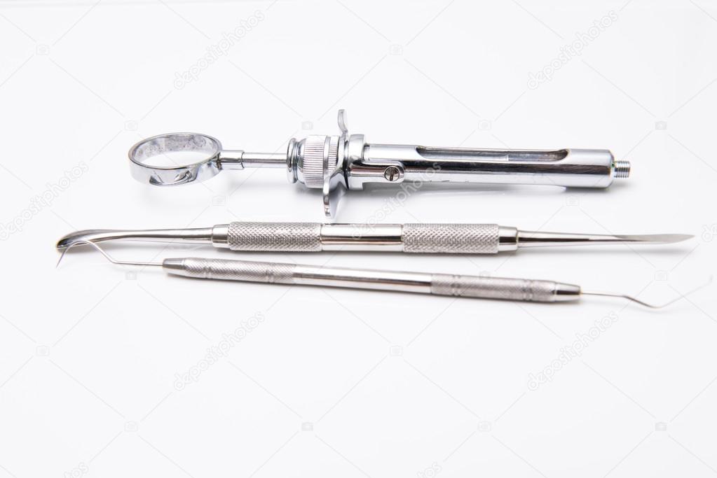 Dental tools in dental clinic Stock Photo by ©kikujungboy 63444935