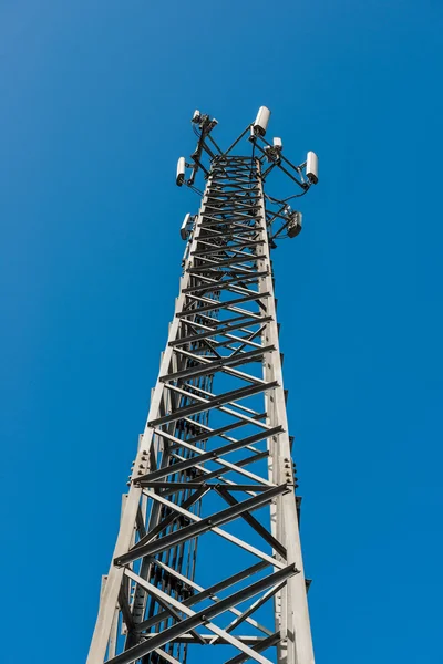 Transmitter mast and barbed wire — Stock Photo, Image