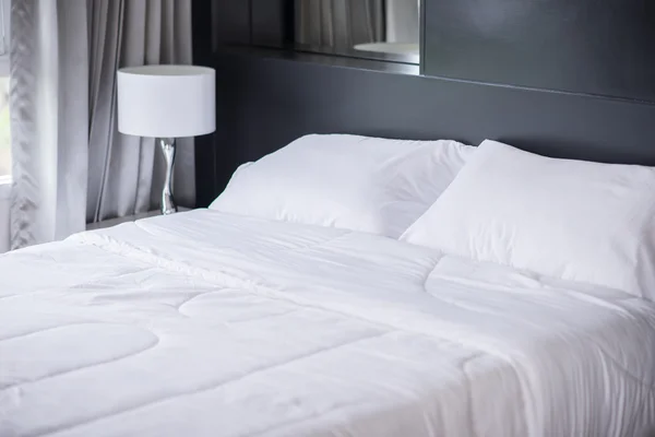 White pillows on  bed — Stock Photo, Image