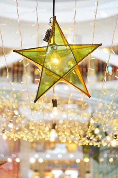 Star och glödlampor dekoration — Stockfoto