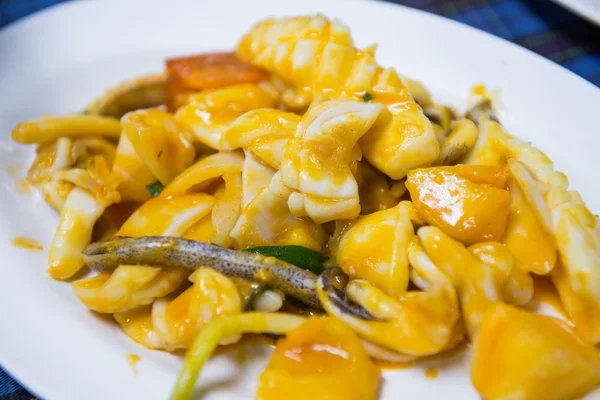 Fried squid with curry powder — Stock Photo, Image