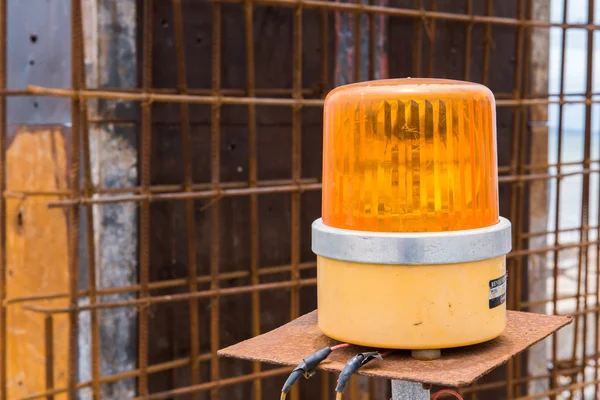 Yellow siren in construction site — Stock Photo, Image