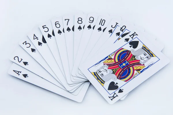 Покерні карти на білому фоні — стокове фото
