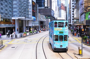 HONG KONG - JUNE 08, Public transport on the street on JUNE 08, 2015 in Hong Kong. Over percent daily travelers use public transport. Trams also a major tourist attraction.
