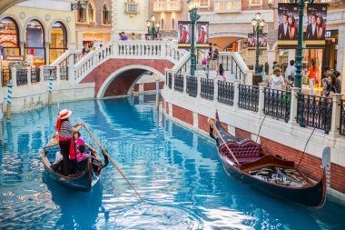 MACAU, CHINA , MAY 22th 2014, The Venetian Hotel, Macao , The famous shopping mall, luxury hotel and the largest casino in the world clipart